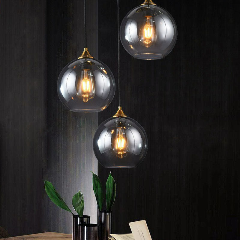 Three-Light Hanging Ceiling Fixture with Tapered Glass Globes in Antique Brass Finish for Dining Room Kitchen Island