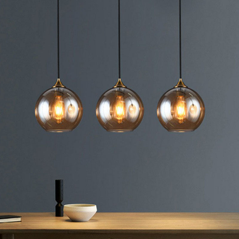 Three-Light Hanging Ceiling Fixture with Tapered Glass Globes in Antique Brass Finish for Dining Room Kitchen Island