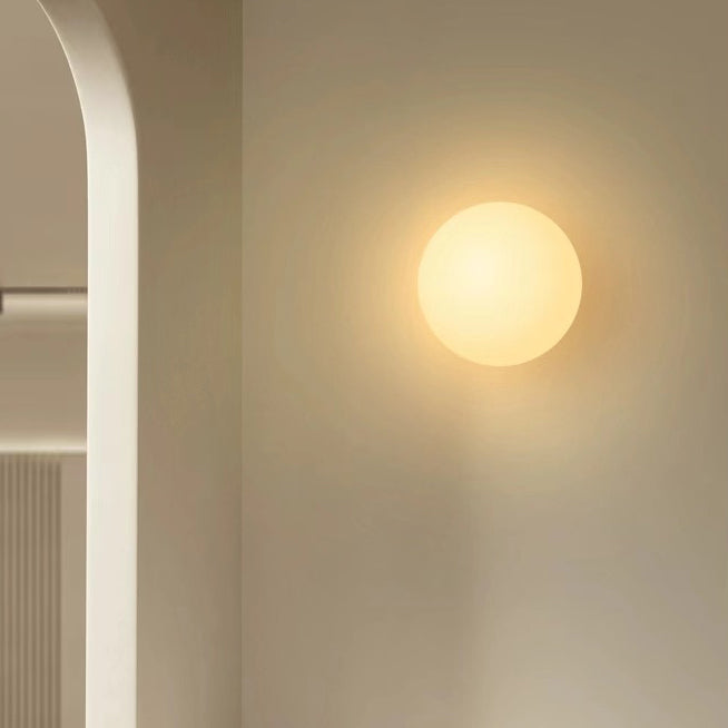 Globe Wall Light Fixture Spherical Shade Bedroom Hallway Ambient Lighting Contemporary Mount Minimal Design Clear Glass Room Accent
