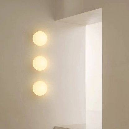 Globe Wall Light Fixture Spherical Shade Bedroom Hallway Ambient Lighting Contemporary Mount Minimal Design Clear Glass Room Accent
