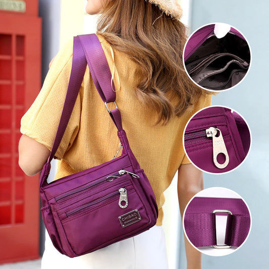 Sac bandoulière en nylon pour femme avec finition résistante à l'eau et bandoulière réglable pour les voyages, le travail et le quotidien