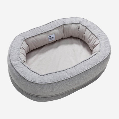 Round Bolster Pet Bed with Orthopedic Foam Support for Dogs | Raised Edge Calming Bed with Machine Washable Cover & Waterproof Liner