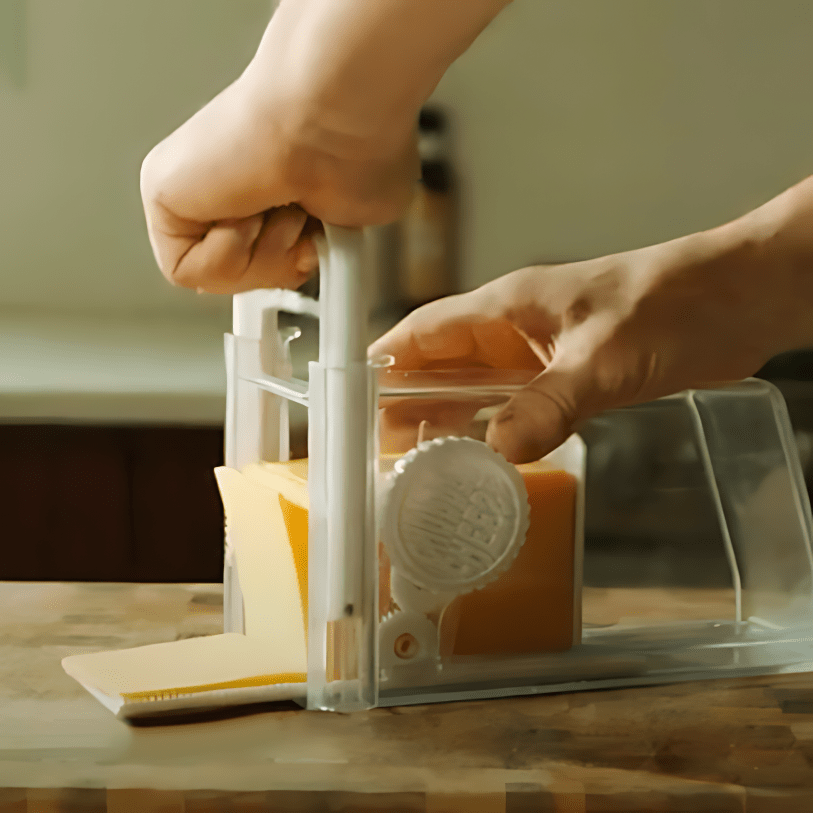 Kitchen Master | 4-in-1 Cheese Slicer & Grater with Built-In Storage | Versatile Food Prep Tool for Easy Cooking