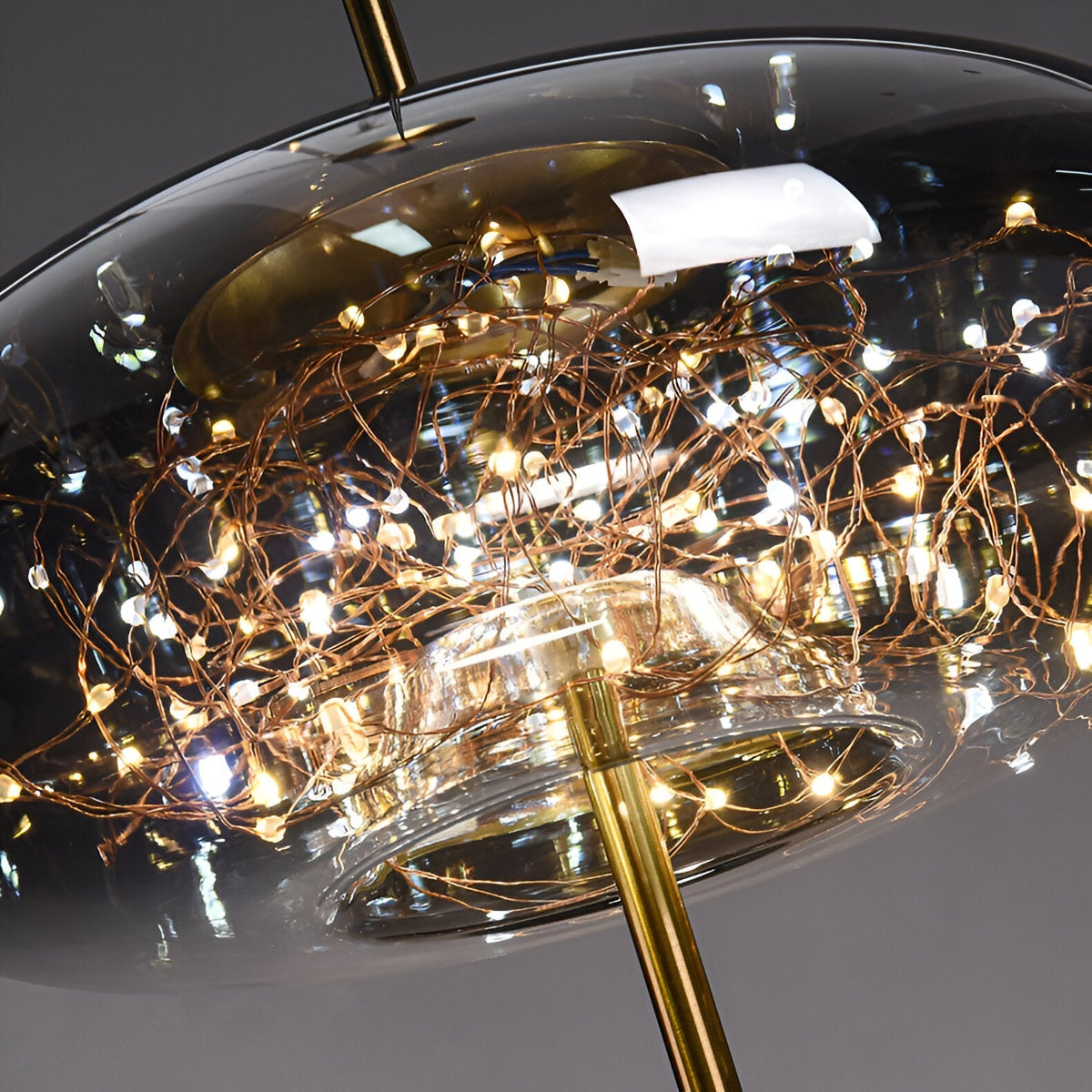 Glass Hanging Fixture with Adjustable Cord for Dining Table & Kitchen Island | Modern Suspended Light in Amber or Gray | Oval Sphere Capsule