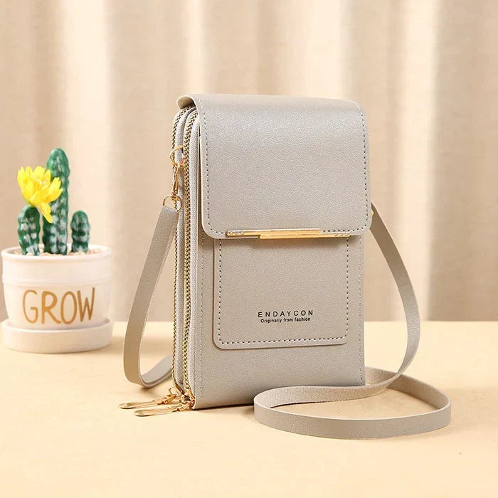 Sac bandoulière compact anti-RFID pour femme avec compartiment étanche pour téléphone, idéal pour les voyages