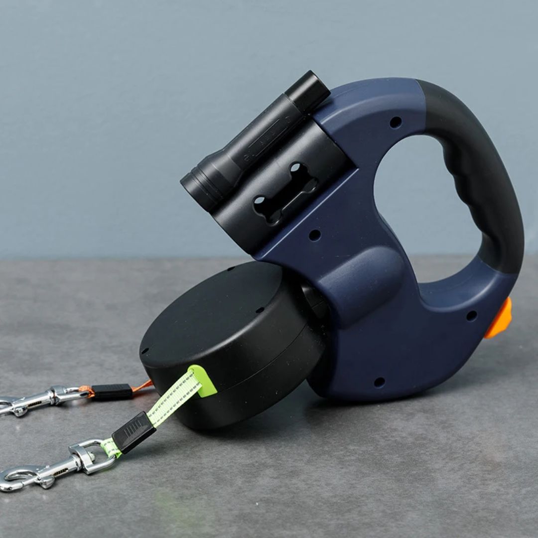 Laisse rétractable double pour deux chiens avec lampe de poche intégrée et distributeur de sacs à déjections