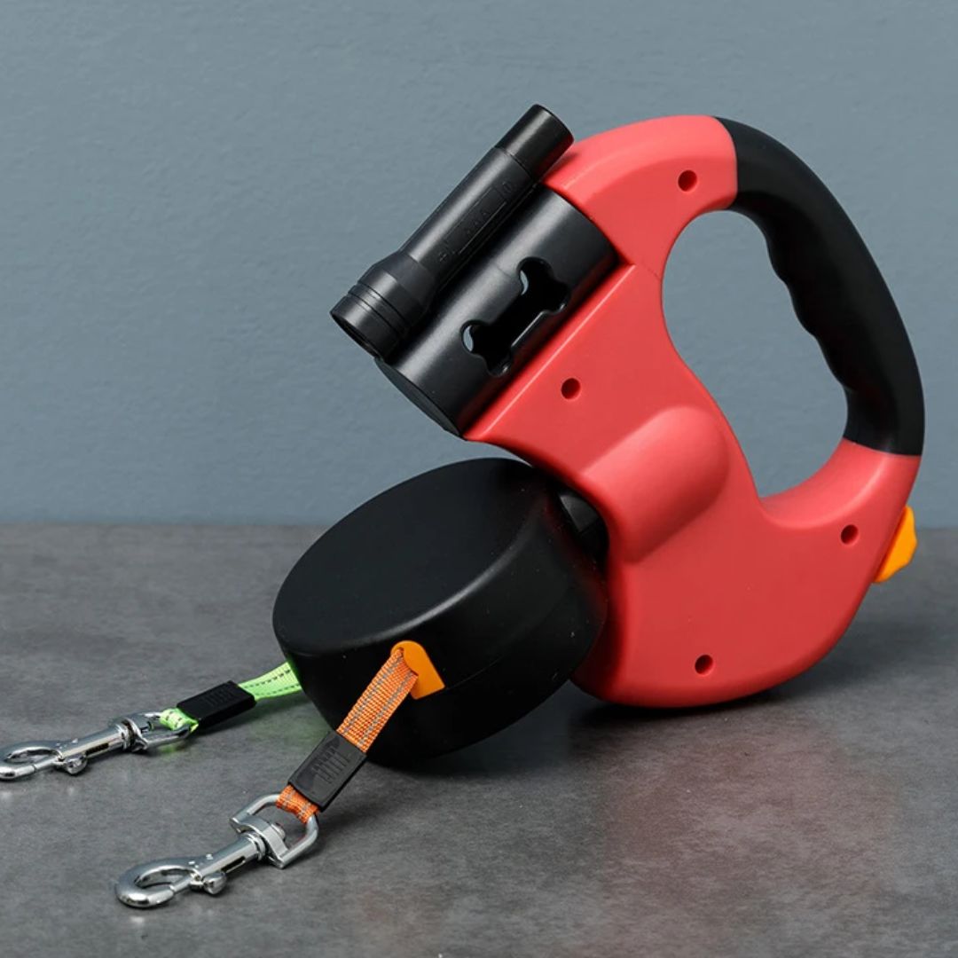 Laisse rétractable double pour deux chiens avec lampe de poche intégrée et distributeur de sacs à déjections
