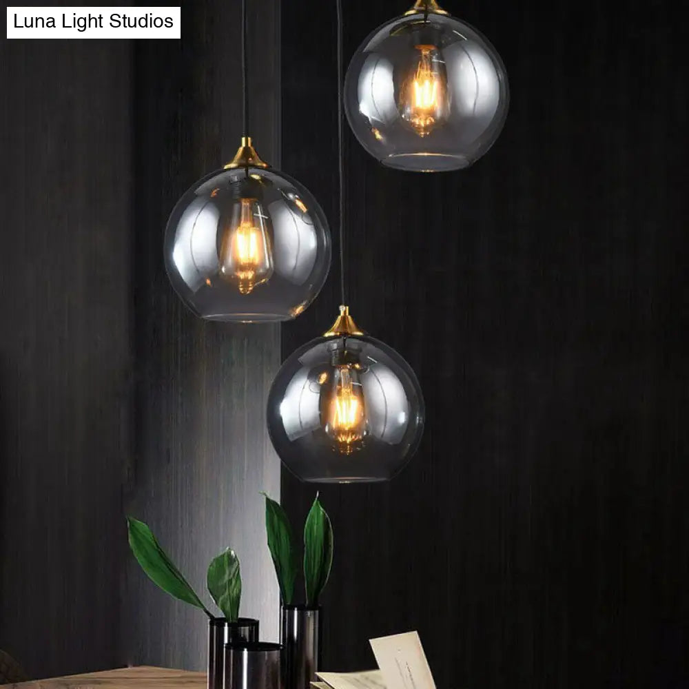 Three-Light Hanging Ceiling Fixture with Tapered Glass Globes in Antique Brass Finish for Dining Room Kitchen Island