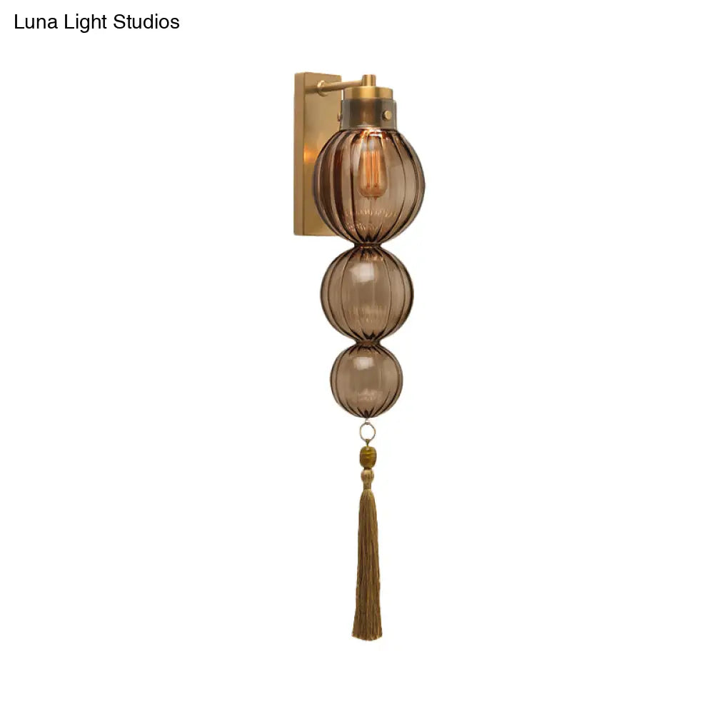 Round Glass Wall Sconce with Decorative Tassel | Asian-Inspired Globe Fixture | Chrome or Brass Finish for Living Room, Hallway, Bedroom