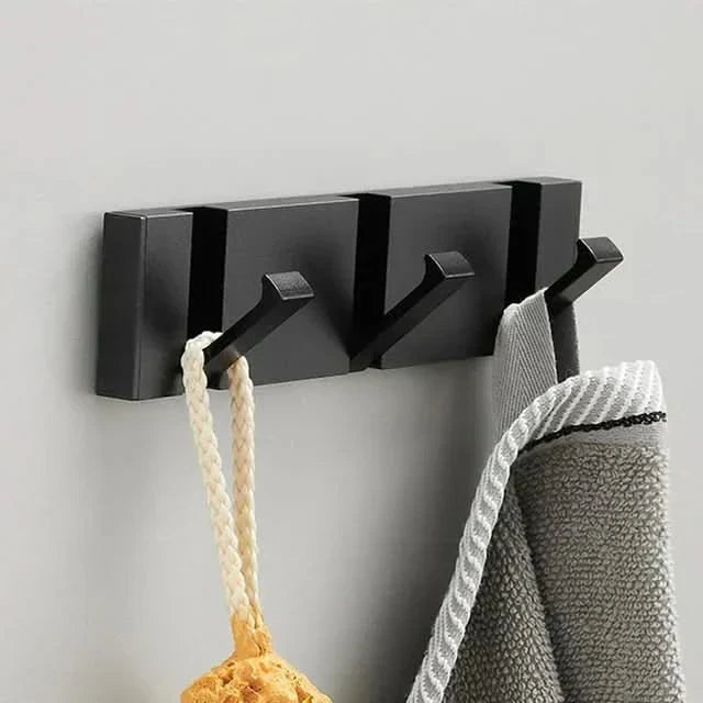 Patère murale élégante et peu encombrante au design pliable