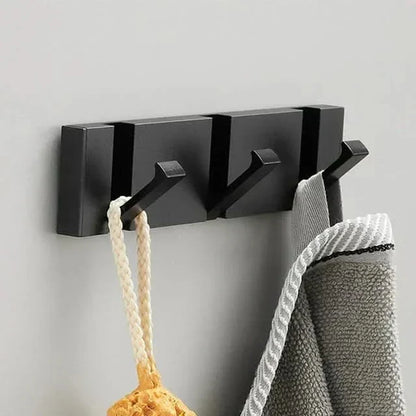 Patère murale élégante et peu encombrante au design pliable