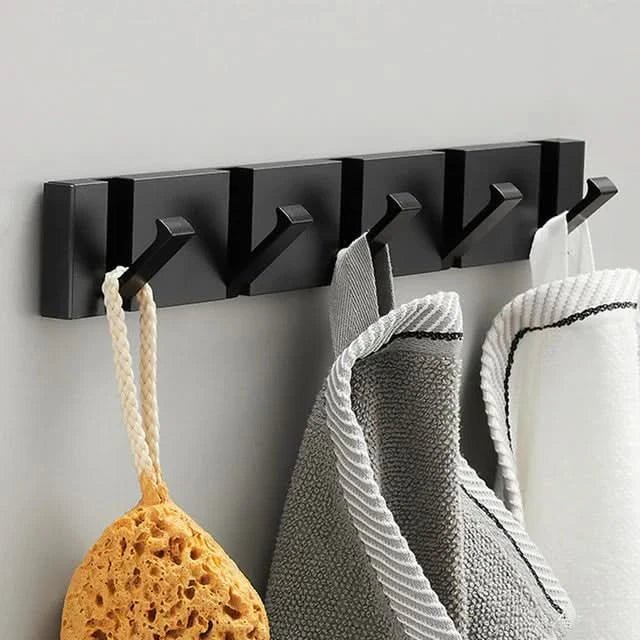 Patère murale élégante et peu encombrante au design pliable