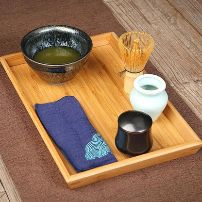 Service à thé vert classique avec tasse en céramique et accessoires en bambou