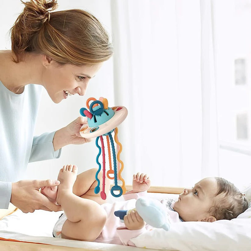 Jouet de dentition souple pour bébé avec cordon à tirer