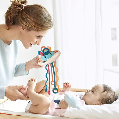 Jouet de dentition souple pour bébé avec cordon à tirer