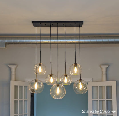 Seven-Globe Hanging Light with Adjustable Height Cords for Kitchen Island & Dining Table, Clear Glass Spheres, 35-Inch Canopy, E26 Base, Dim