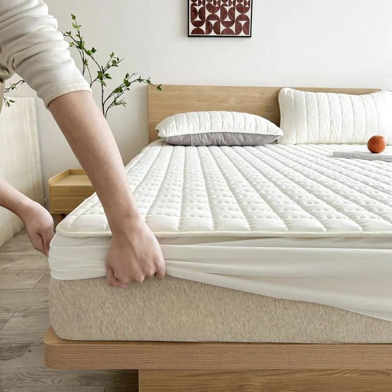 Protège-matelas moelleux en peluche pour un sommeil profond