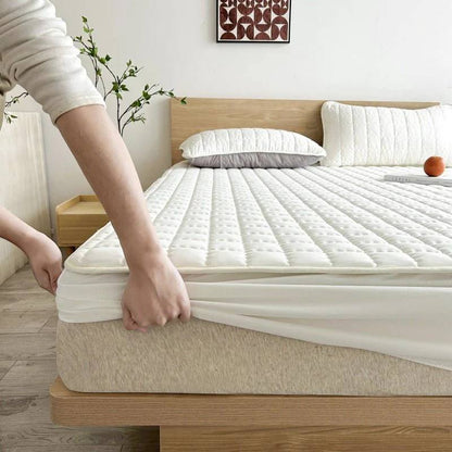 Protège-matelas moelleux en peluche pour un sommeil profond